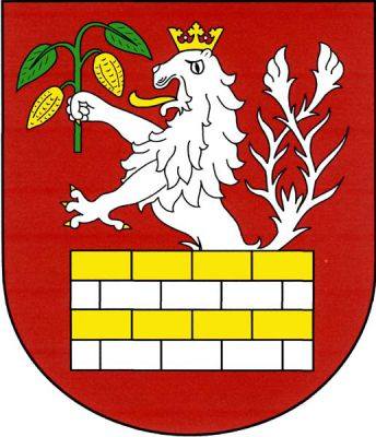 V červeném štítě volná čtyřmi řadami střídavě zlato-stříbrně kvádrovaná zeď, z níž vyrůstá stříbrný dvouocasý korunovaný lev se zlatou zbrojí držící v pravé tlapě zelenou větévku kakaovníku se dvěma listy a dvěma zlatými plody. Znak Velim