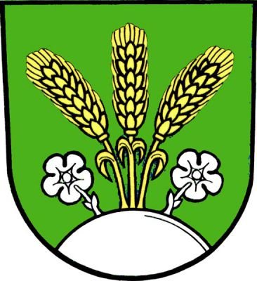 V zeleném štítě ze stříbrného návrší vyrůstající tři zlaté, krajní od středního odkloněné obilné klasy, provázené po obou stranách stříbrným květem na stonku. Znak Velká Štáhle
