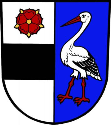 Ve stříbrno-modře polceném štítě vpravo černé břevno provázené nahoře červenou růží se zlatým semeníkem a kališními lístky, vlevo stříbrný čáp s černým křídlem a červenou zbrojí. Znak Velký Třebešov