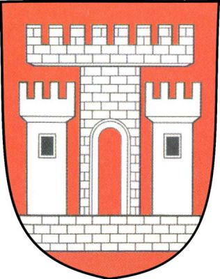 V dolní části červeného štítu nízká kvádrovaná zeď, z ní vyrůstá uprostřed kvádrovaná věž s prázdnou branou a širokým cimbuřím a po stranách dvě menší věže s cimbuřím a jedním černým oknem, vše stříbrné. Znak Veselí nad Moravou