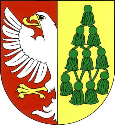V červeno-zlatě polceném štítě vpravo vynikající půl stříbrné orlice se zlatou zbrojí, vlevo deset zelených střapců z arcibiskupského klobouku. Znak Vestec