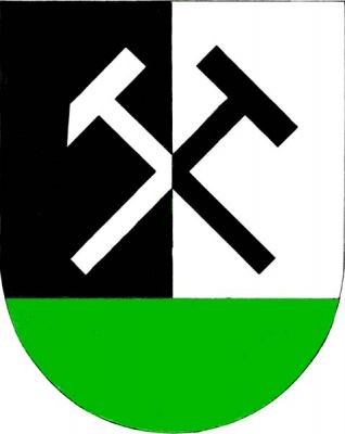 V černo-stříbrně polceném štítě se zelenou patou hornická kladívka opačných barev. Znak Vintířov