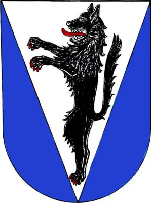 V modrém štítě stříbrný klín, v něm černý vlk ve skoku s červenou zbrojí. Znak Vlčice