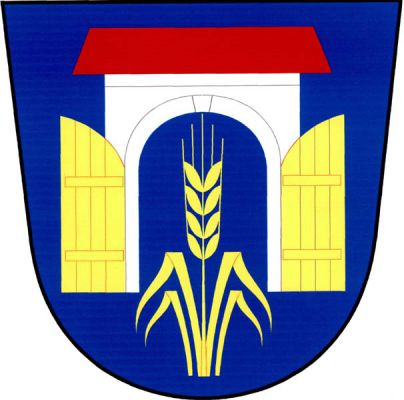 V modrém štítě stříbrná prázdná brána se zlatými otevřenými vraty a s červenou valbovou střechou. Uprostřed obilný klas se čtyřmi listy (2,2), vše zlaté. Znak Vrátno