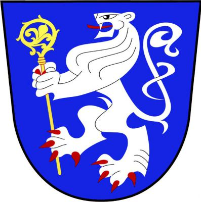 V modrém štítě stříbrný lev s červenou zbrojí a jazykem držící zlatou berlu. Znak Všechovice