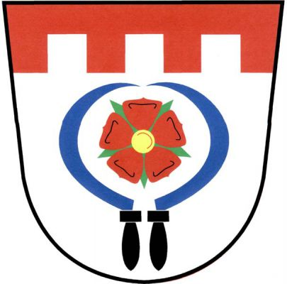Ve stříbrném štítě pod červenou cimbuřovou hlavou dva přivrácené modré srpy s černými rukojeťmi, mezi nimi červená růže se zlatým semeníkem a zelenými kališními lístky. Znak Vysoká Srbská