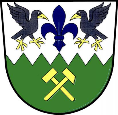 Ve stříbrno-zeleně pilovitě děleném štítě nahoře modrá lilie mezi dvěma do středu obrácenými rozkřídlenými černými havrany se zlatou zbrojí, dole kosmý mlátek šikmo přeložený kladívkem. Znak Zahájí