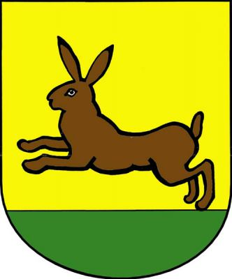 Ve zlatém štítě na zeleném trávníku běžící zajíc přirozených barev. Znak Zaječí