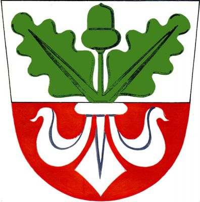 Ve stříbrno-červeně děleném štítě vyrůstá nahoře zelená dubová větev s jedním vztyčeným žaludem mezi dvěma listy, dole spodní polovina stříbrné lilie. Znak Zástřizly