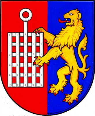 V červeno-modře polceném štítě zlatý lev s červenou zbrojí a jazykem držící před sebou stříbrný rošt svatého Vavřince. Znak Žeranovice